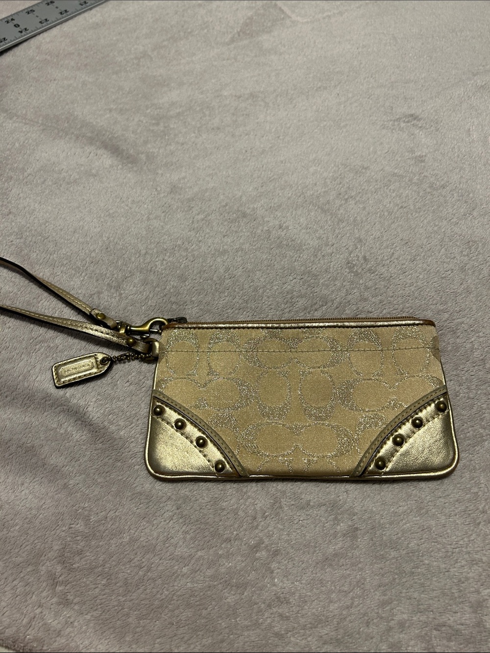 Coach Gold Signature Wristlet with Studded Corner Accents